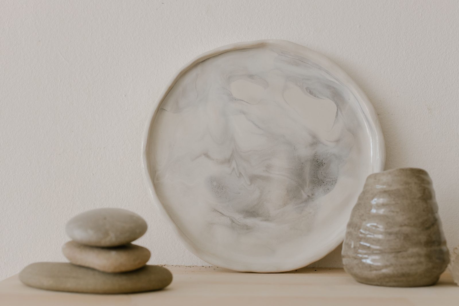 Beautiful polished stones in a decorative bowl